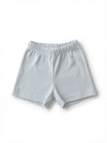 Light blue and white striped shorts with an elastic waistband, laid flat on a white background.