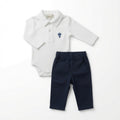Baby two-piece clothing set featuring a white long-sleeve polo bodysuit with a small blue hot air balloon logo on the chest, paired with navy blue elastic-waist pants, laid flat on a white background.