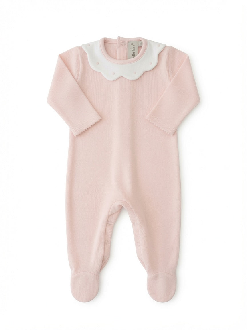 A light pink baby footie with long sleeves, a scalloped white collar, and matching pink foot covers, shown flat on a white background from front side.
