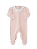 A light pink baby footie with long sleeves, a scalloped white collar, and matching pink foot covers, shown flat on a white background from front side.
