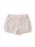 A pair of light pink striped baby bubble shorts with an elastic waistband and two decorative buttons made from Peruvian pima cotton