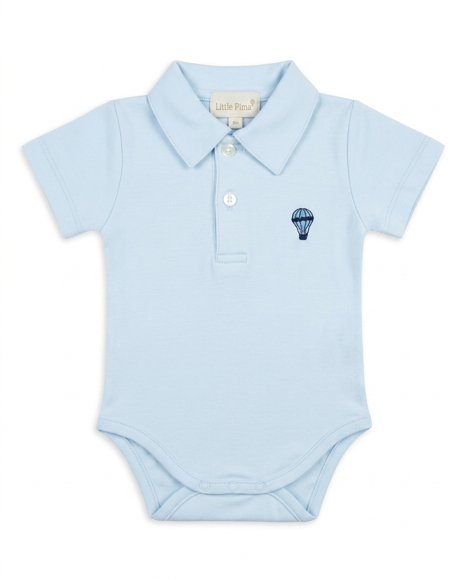 A light blue short-sleeve baby polo bodysuit with a small navy blue hot air balloon embroidery on the left chest, shown on a plain white background.