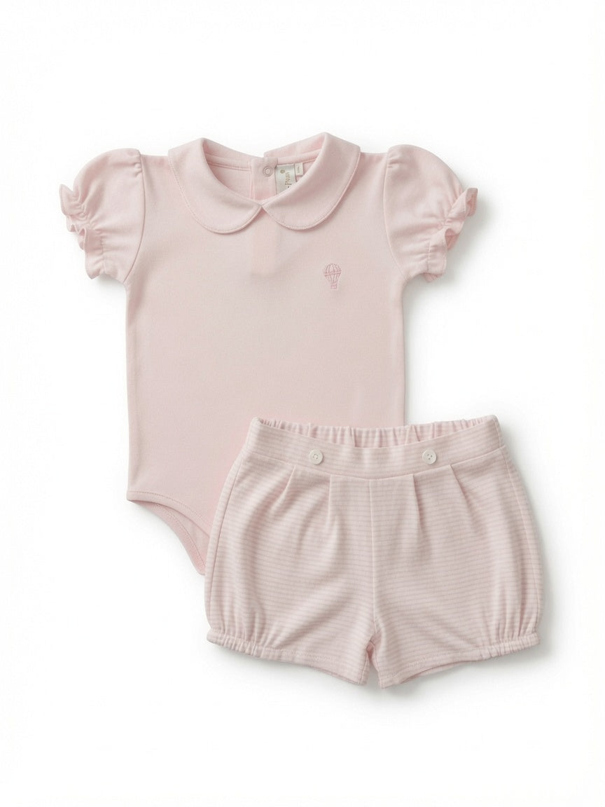 A baby girl's two-piece outfit set consisting of a pink short-sleeve bodysuit with a Peter Pan collar and matching textured bubble shorts, laid flat on a white background.